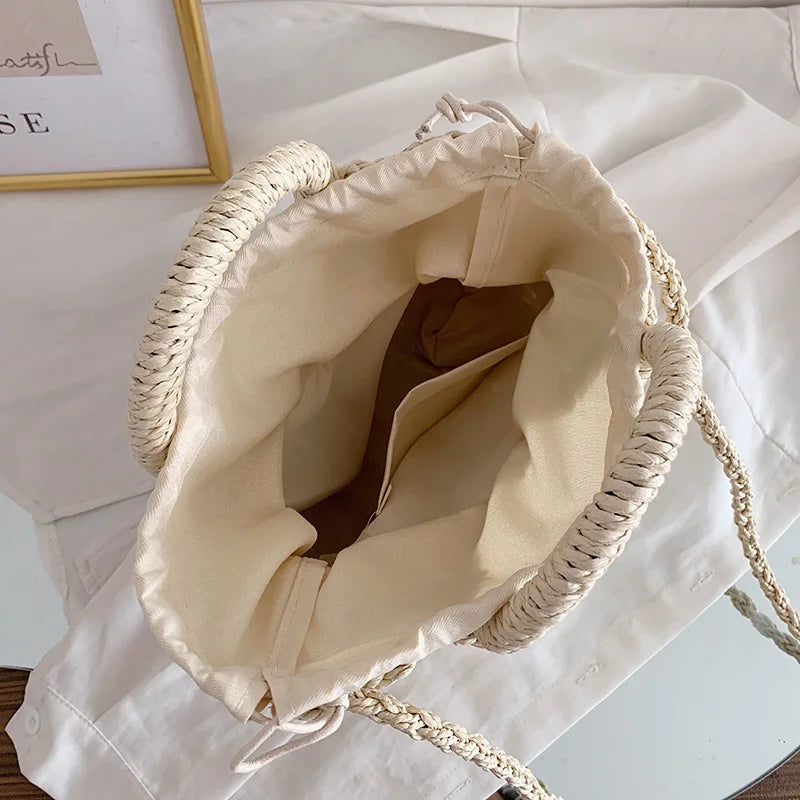 HANDWOVEN HALF-MOON STRAW BASKET BAG