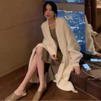 LONG KNITTED CARDIGAN WITH V-NECK SOLELII