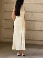 SLEEVELESS KNITTED DRESS WITH ROUND NECK SOLELII